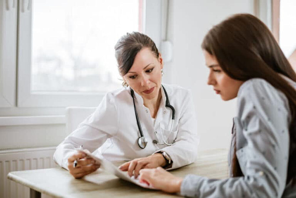 doctor reviewing treatment options with patient