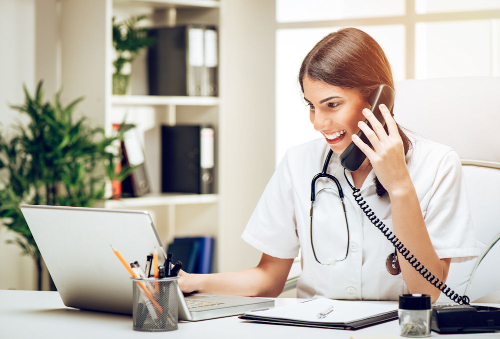 receptionist verifying insurance over phone