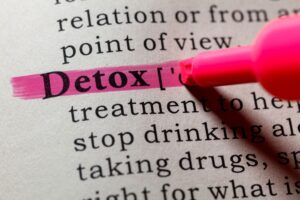 Alcohol Withdrawal Symptoms Illinois - A pink highlighter marks the word Detox in bold print on a dictionary page definition