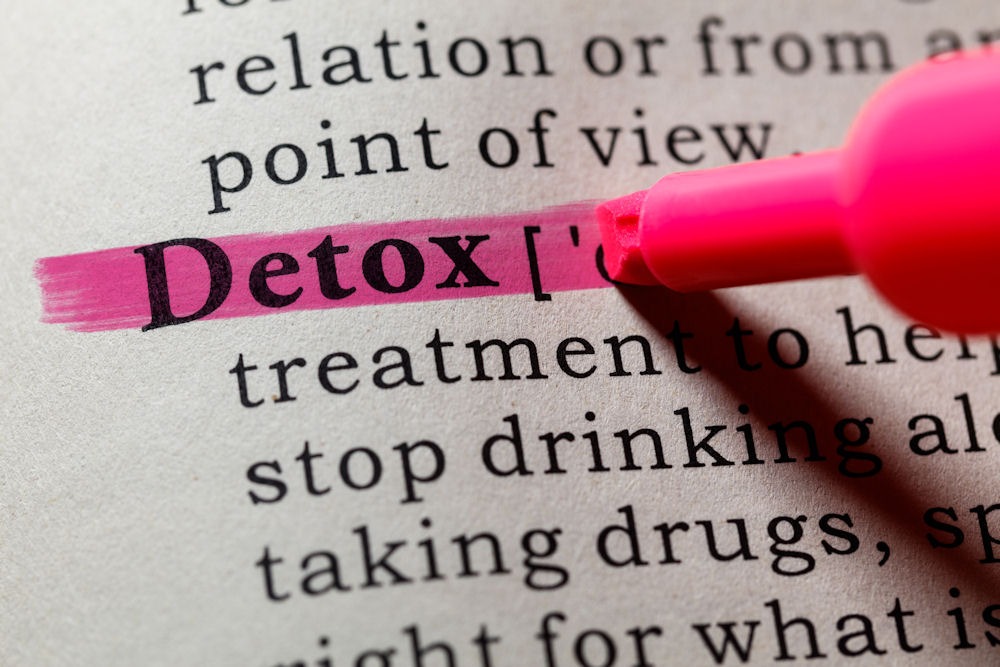 alcohol-detox A pink highlighter marks the word Detox in bold print on a dictionary page, emphasizing its definition among other text like alcohol detox and drug detox.